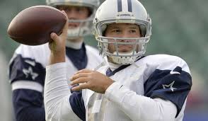 Tony Romo practices for the Cowboys in London