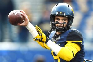 West Virginia quarterback Clint Trickett said he'll retire from playing football after suffering five concussions in the past 14 months