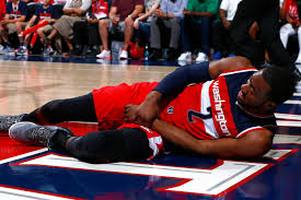 Washington Wizards point guard John Wall has 5 non displaced fractures in  his left wrist