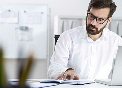 business man studying using laptop