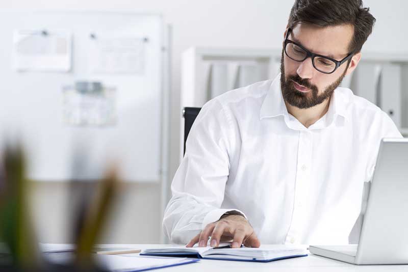 business man studying using laptop