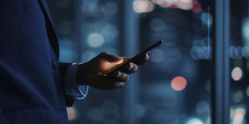 business man in the office using a mobile phone